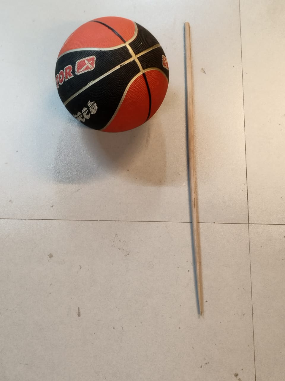 Centripetal force: basketball and Stick