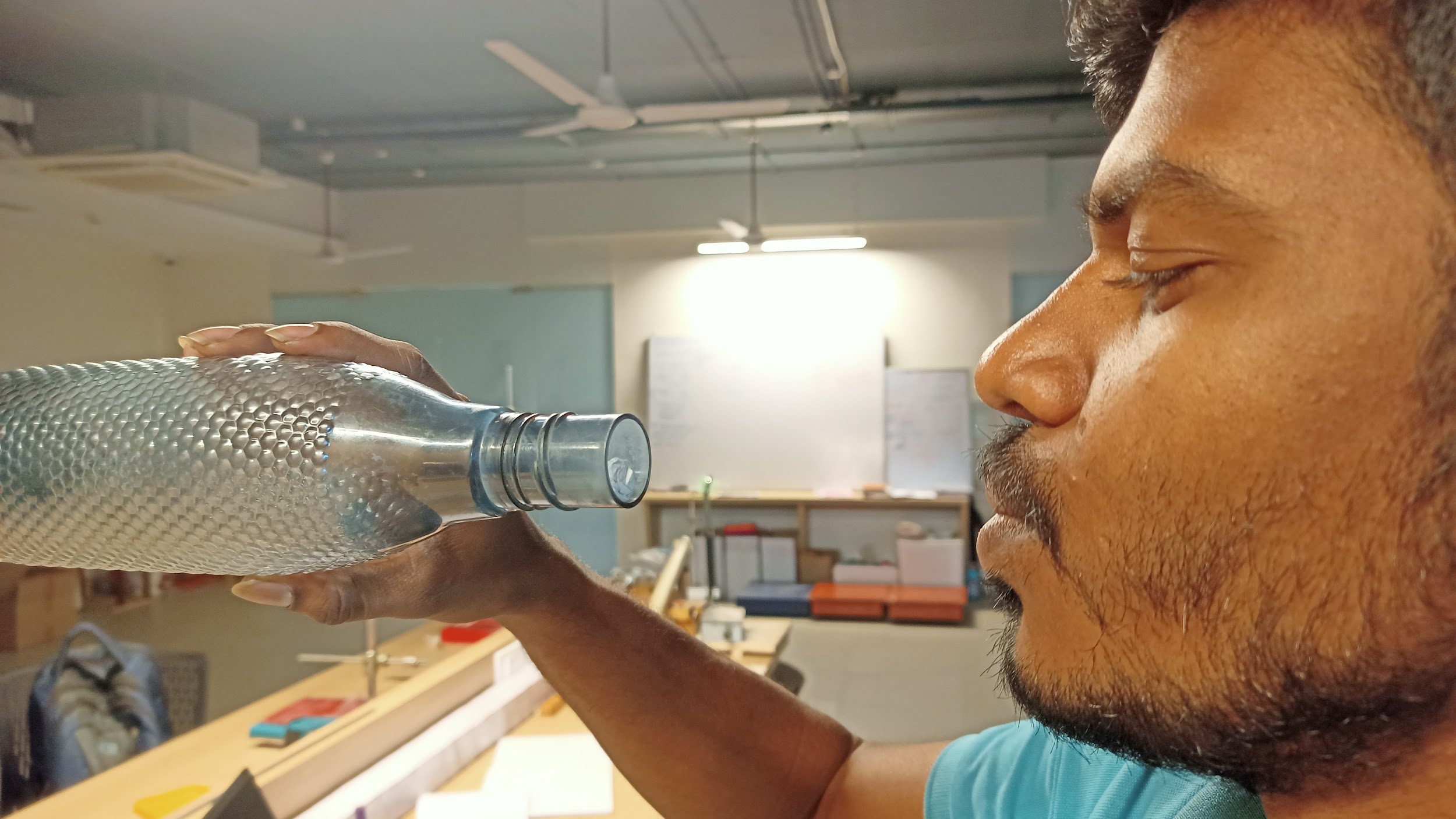 Blowing paper ball inside a bottle