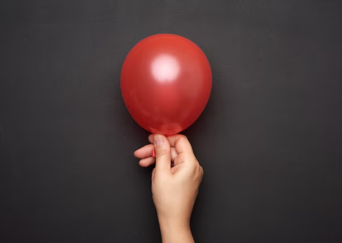 Conservation of linear momentum: Balloon rocket